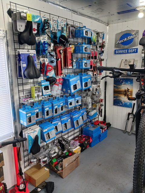 Bicycle service parts and supplies inside JW Bicycle Repair